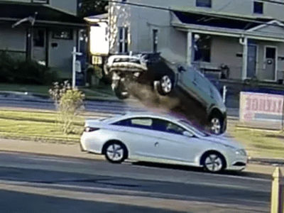 WATCH - Priest Unharmed After SUV Flies over Car: 'God's Hand Was in It'